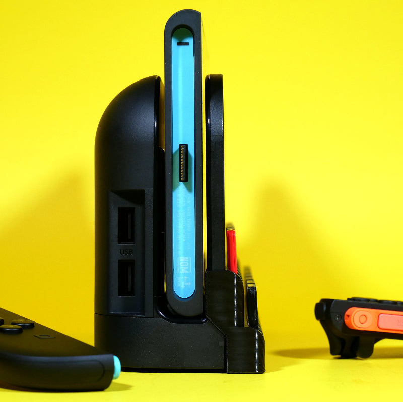 Profile view of Switch 2 dock addon storage installed on dock with system and games