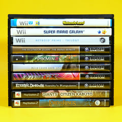 Wii, GameCube, and Playstation 2 games being stored in a modular stackable organizing tower front view
