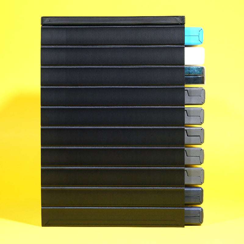Wii, GameCube, and Playstation 2 games being stored in a modular stackable organizing tower profile view