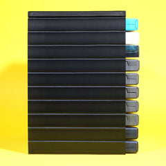 Wii, GameCube, and Playstation 2 games being stored in a modular stackable organizing tower profile view