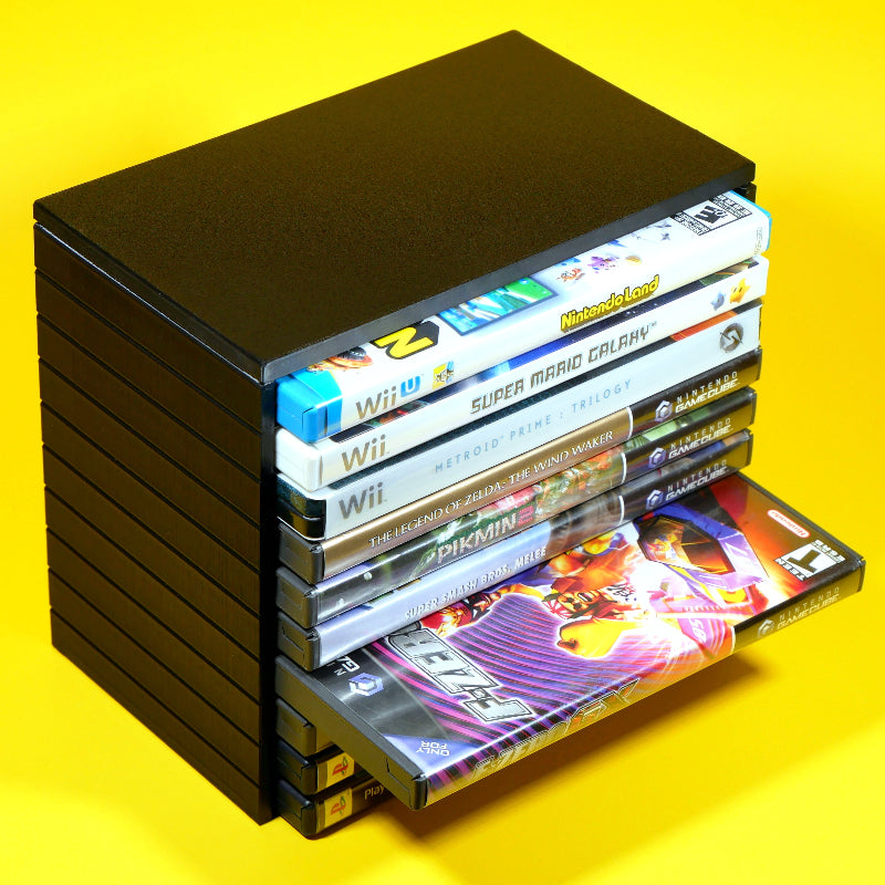Wii, GameCube, and Playstation 2 games being stored in a modular stackable organizing tower