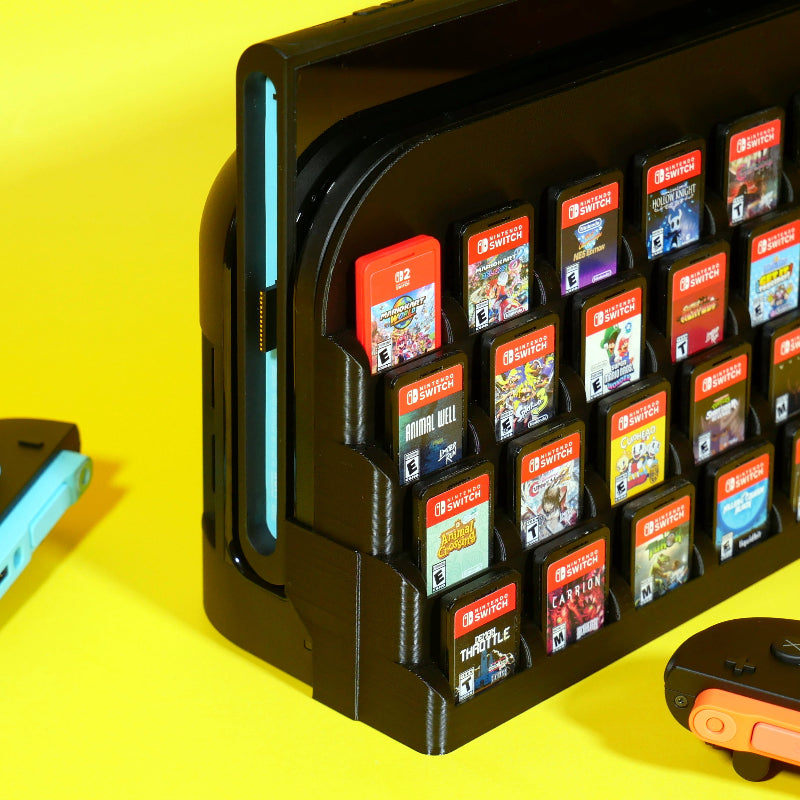 Close up of Switch 2 dock addon with games and system 